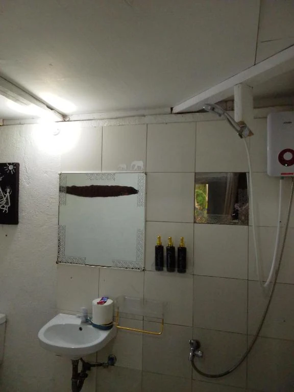 Private bathroom with basin and shower — Family Room with Garden View