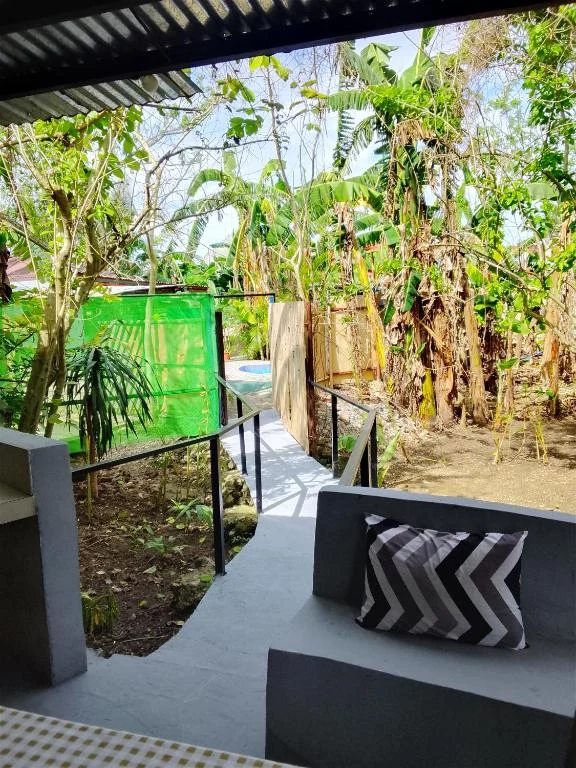 Outdoor bench facing the garden — Family Room