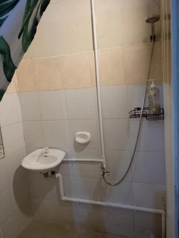 Bathroom with shower and toilet — Family Room