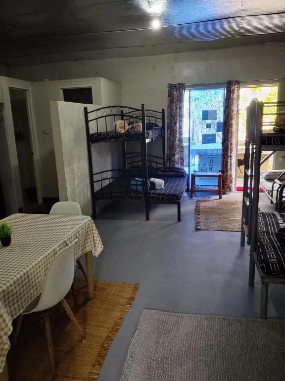 Bunk beds and seating near the terrace doorway — Family Room