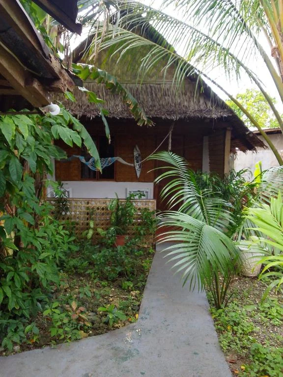Leafy path and garden-facing entrance — Family Room with Garden View